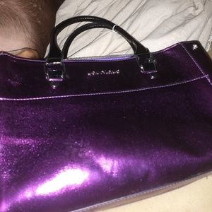 A purple younique purse